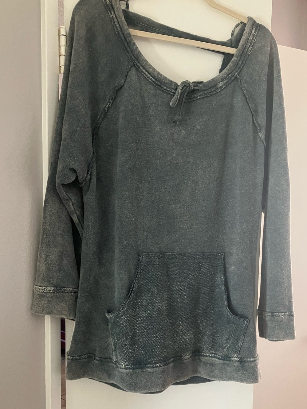 Free People Distressed Sweatshirt in a blue gray acid wash cross back design
